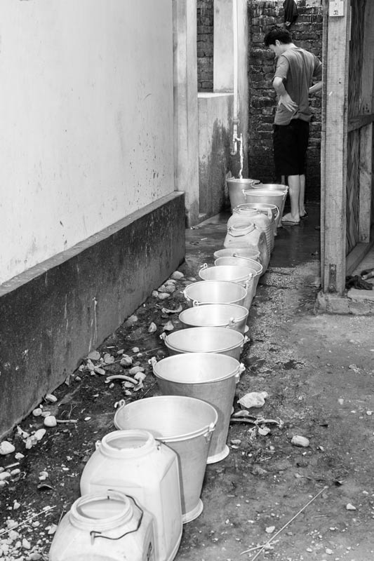 Queue for Drinking Water at a private tap within a factory premises in Dimapur, Nagaland